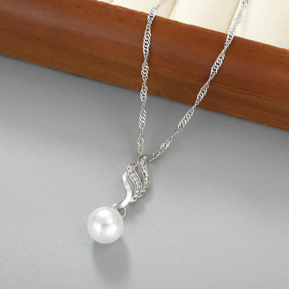Promotional pearl and cz stone necklace and earrings gold or silver finish