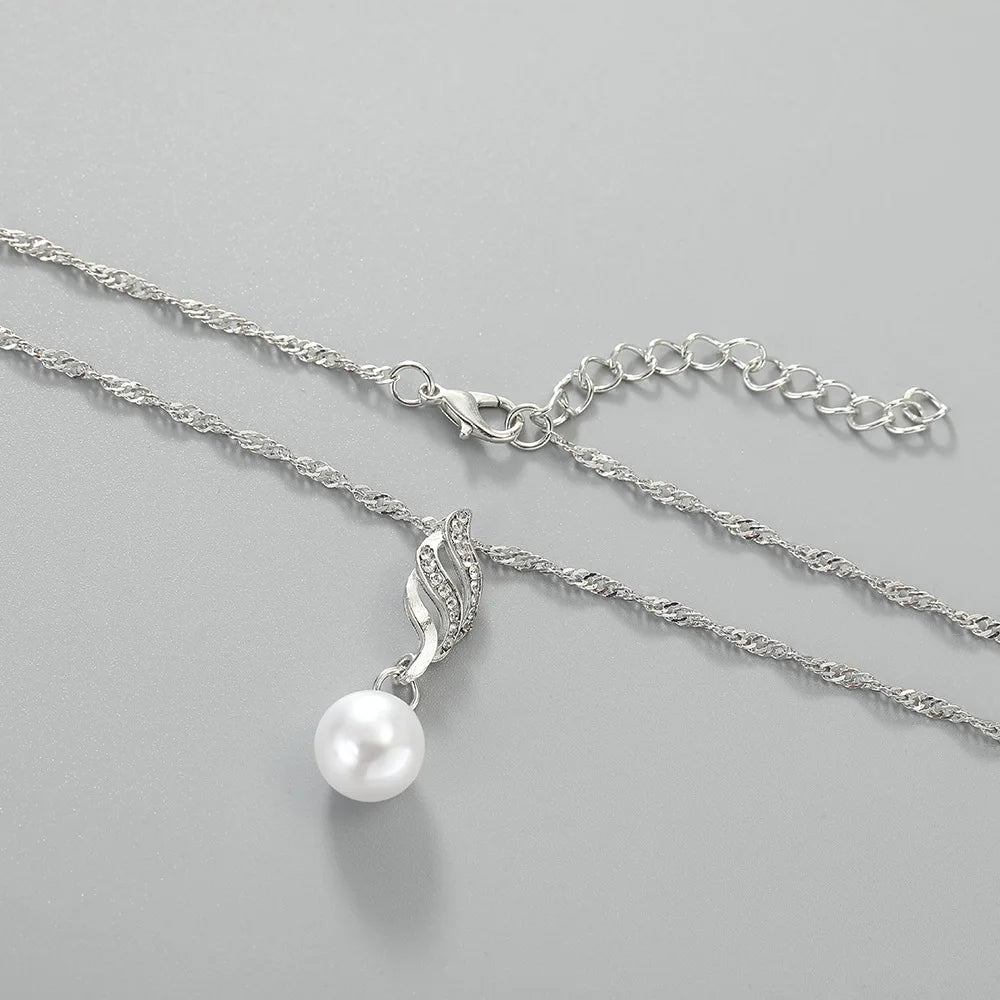 Promotional pearl and cz stone necklace and earrings gold or silver finish